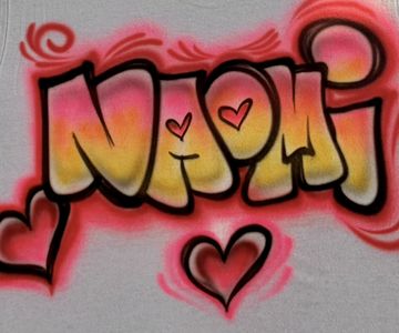 Custom airbrushed Naomi lettering with hearts
